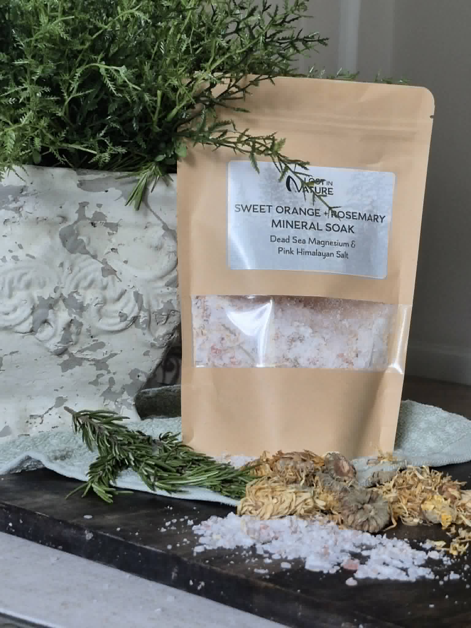 Sweet Orange and Rosemary Mineral Soak with rosemary and pink mineral salt